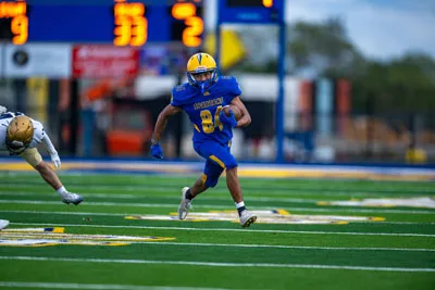Football action shot — Homestead vs. Bishop Dwenger, Fort Wayne Indiana