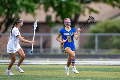 Girls Lacrosse action shot — Homestead vs. Noblesville, Fort Wayne Indiana