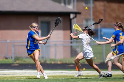 Girls Lacrosse action shot — Homestead vs. Noblesville, Fort Wayne Indiana