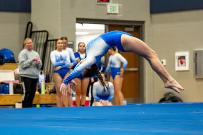 Gymnastics action shot — Homestead vs. East Noble, Fort Wayne Indiana