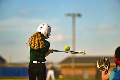 Softball action shot — Lawn Stars vs. Saylors Concrete, Fort Wayne Indiana
