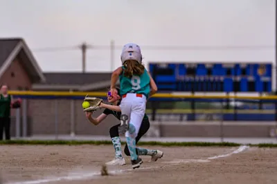 Softball action shot — Lawn Stars vs. Saylors Concrete, Fort Wayne Indiana